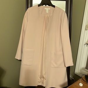 H&M light pink long trouser jacket. Beautiful condition.